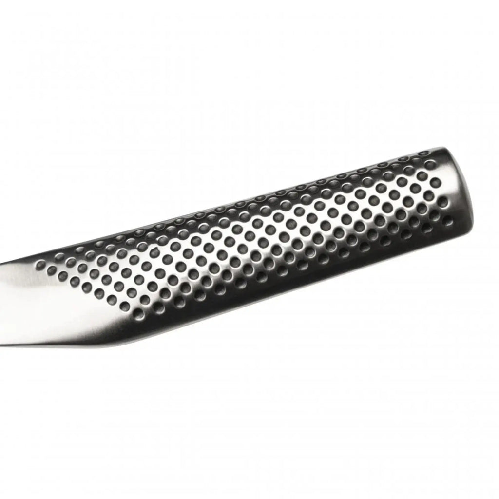 Metallic object with a textured surface on a white background