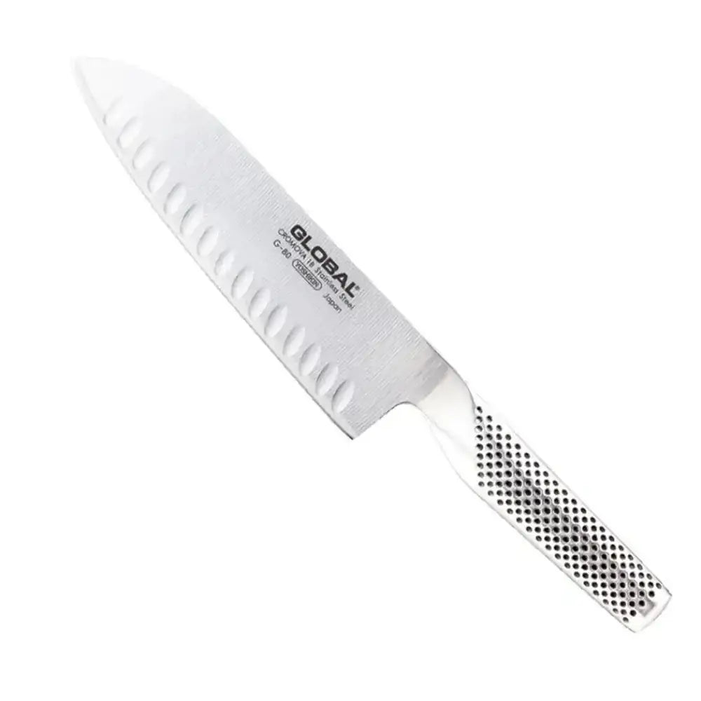 White kitchen knife with a textured handle on a white background, featuring the Global brand.