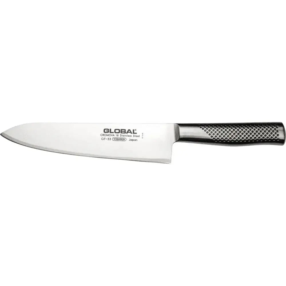 Chef's knife with a black handle on a white background, featuring the Global brand.