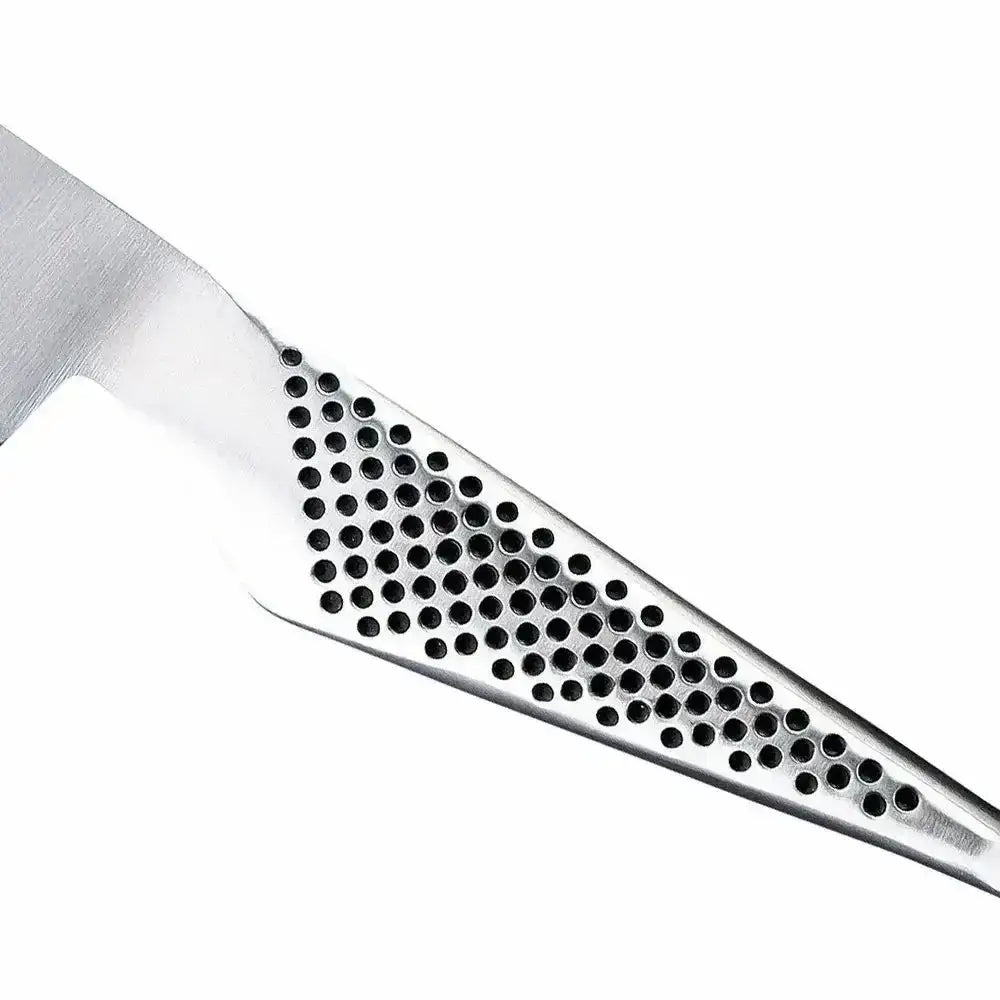 Close-up of a metal tool with a textured surface on a white background