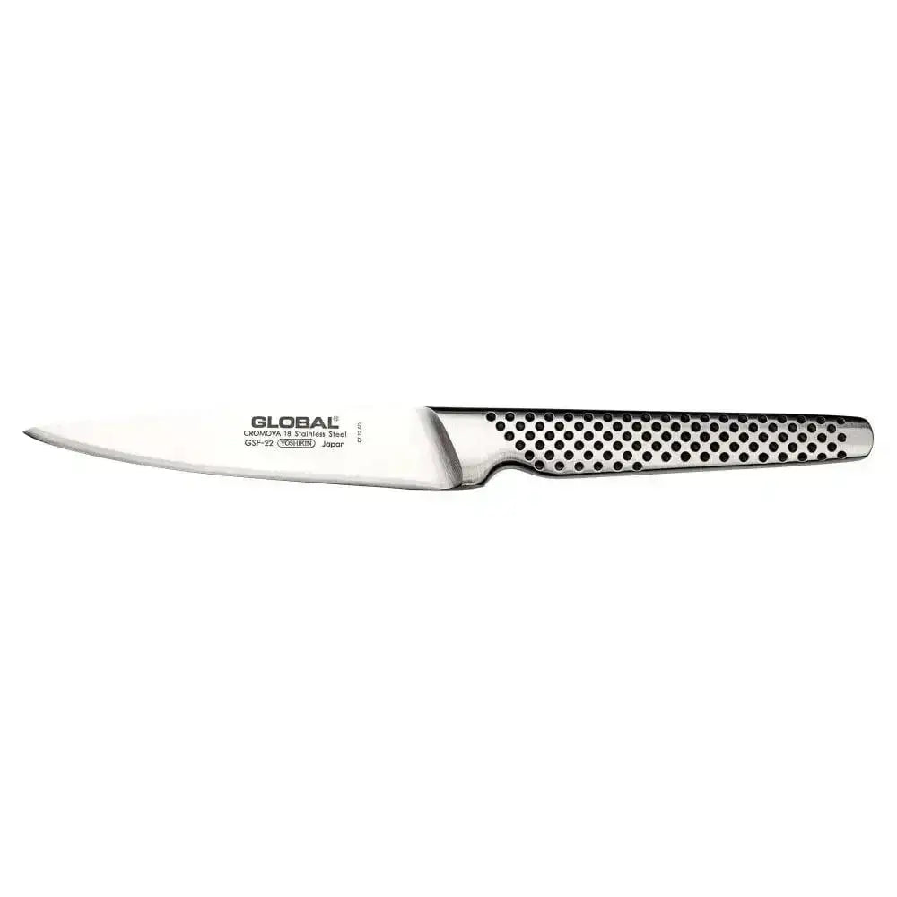 Knife with a textured handle on a white background, featuring the Global brand.