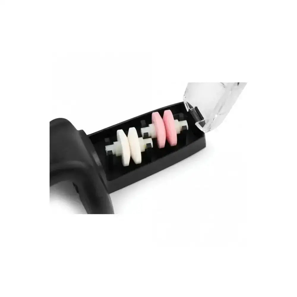 Black tool with white and pink cylindrical objects on a white background