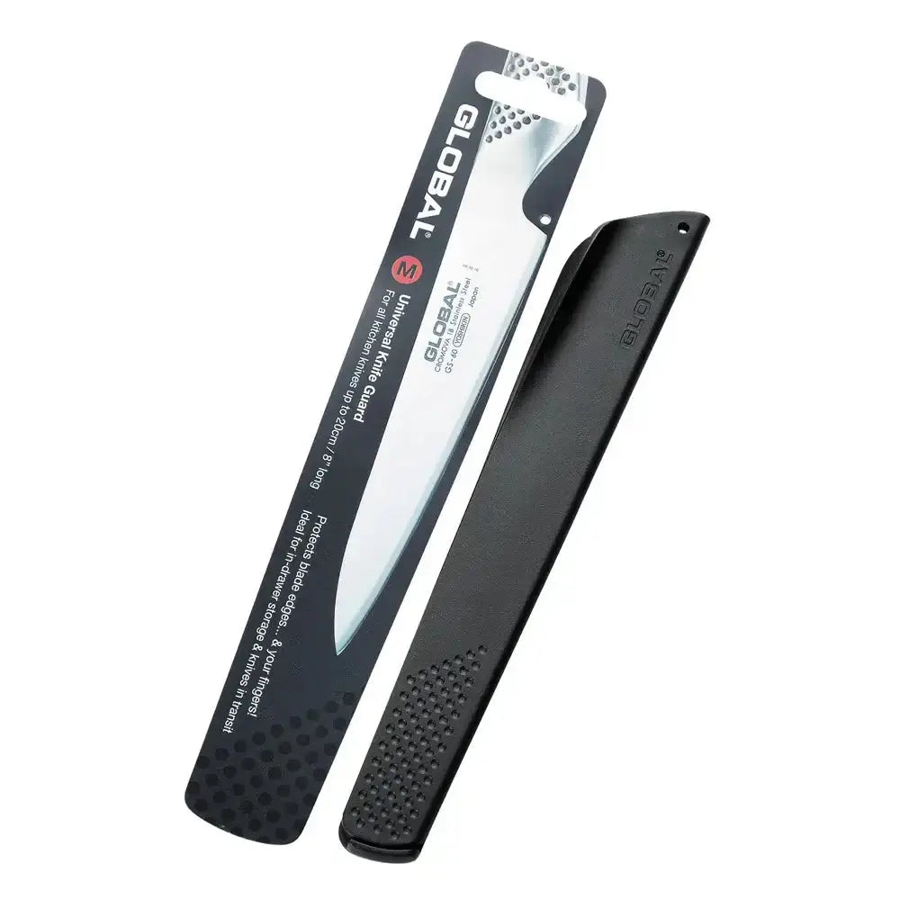 Black Global knife with sheath on a white background