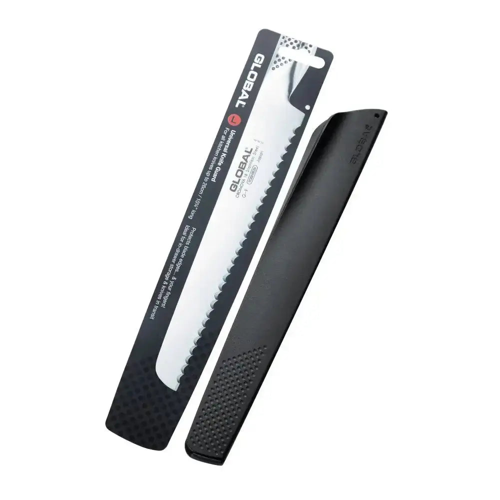 Serrated knife with black sheath on a white background