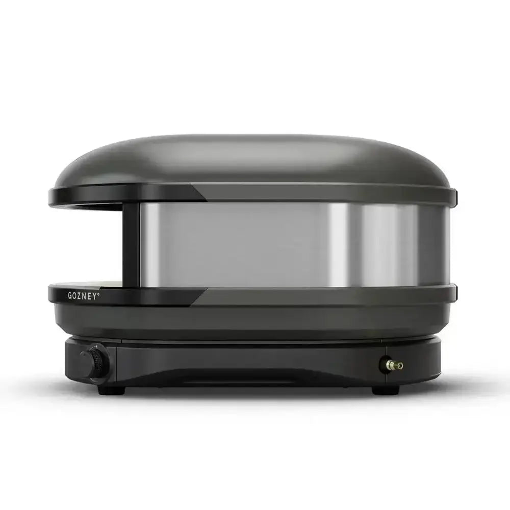 Black and silver gozney electric pancake maker with sleek rounded design featured in gozney arc 14 inch compact pizza oven