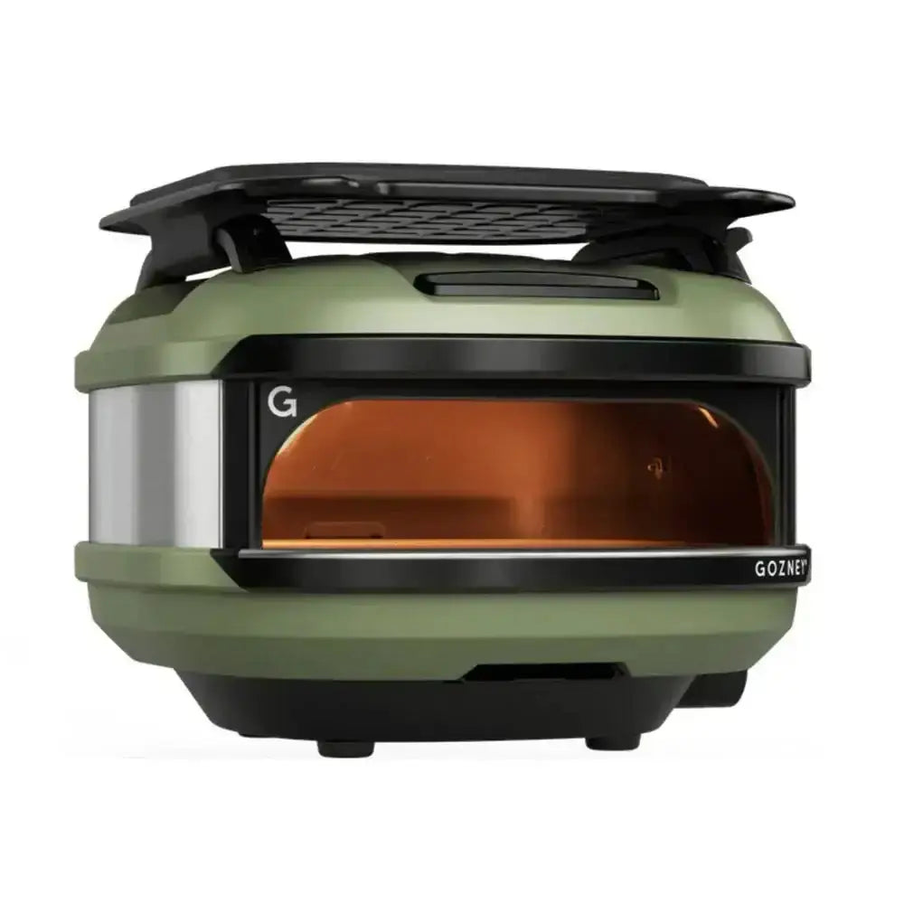 Gozney outdoor pizza oven in green with roof rack accessory, premium kitchenware at Cookin Stores