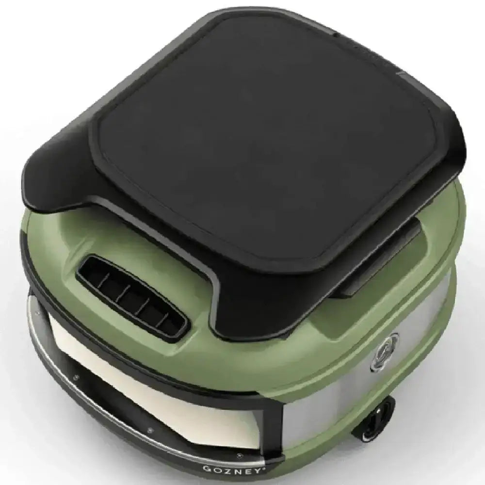 Gozney olive green portable pizza oven with black roof rack accessory at Cookin Stores