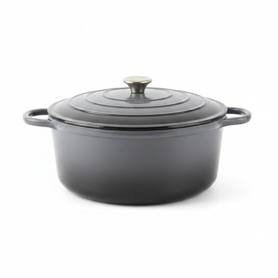 Gray enameled cast iron Dutch oven with lid on a white background