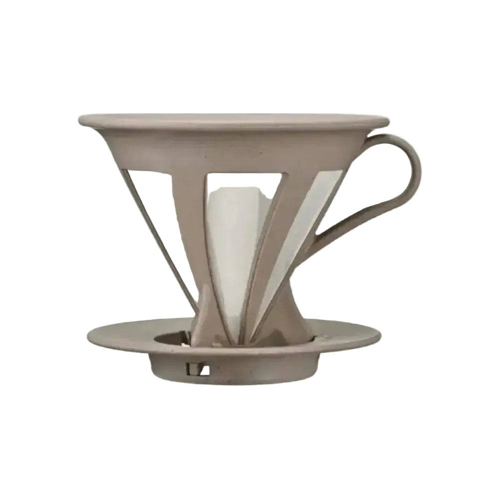 Beige ceramic coffee dripper on a white background