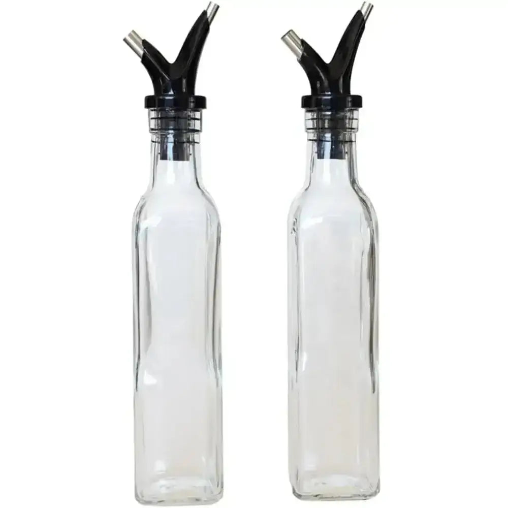 Two clear glass bottles with black nozzles on a white background