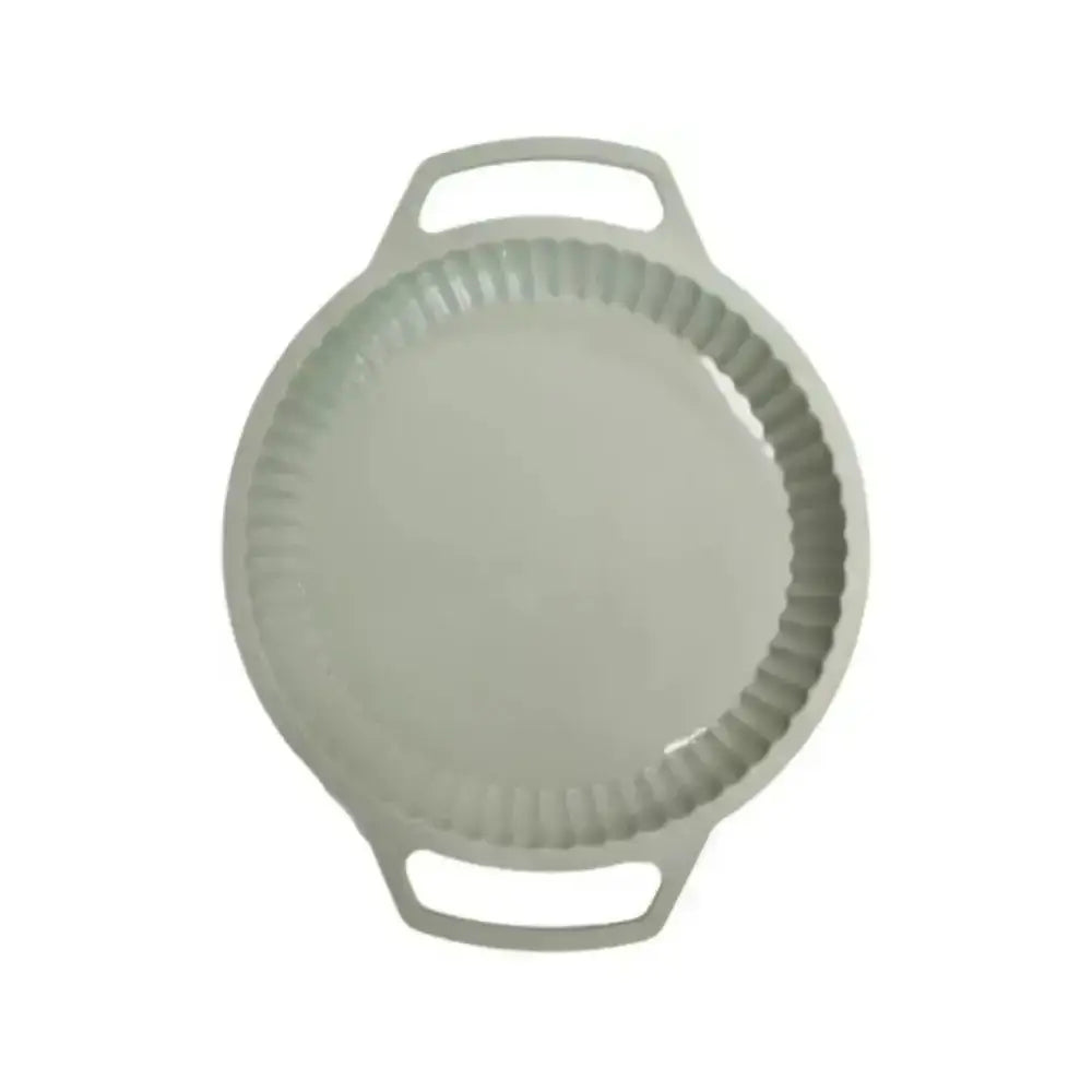 Green pie dish with handles on a white background