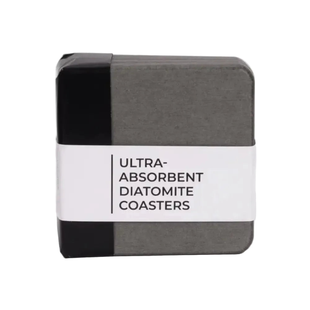 Box of ultra-absorbent diatomite coasters with a white label on a light gray background