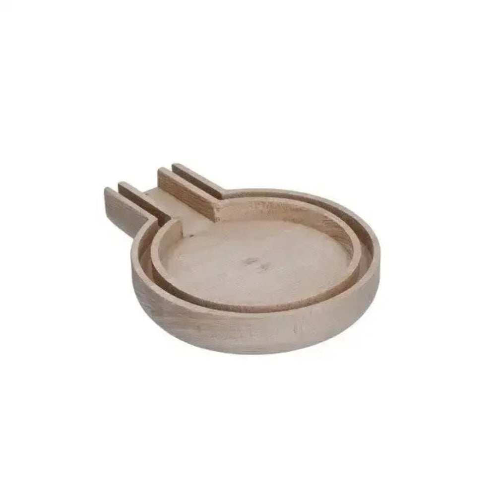 Wooden spoon rest on a white background