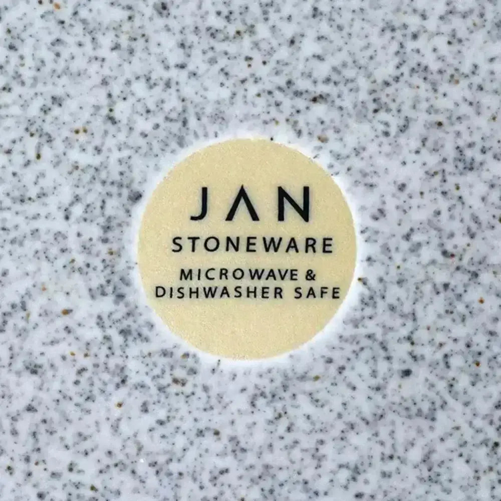 Beige circular label on the back of jan ashes and olive sugar pot 300ml stoneware grey stating microwave and dishwasher safe