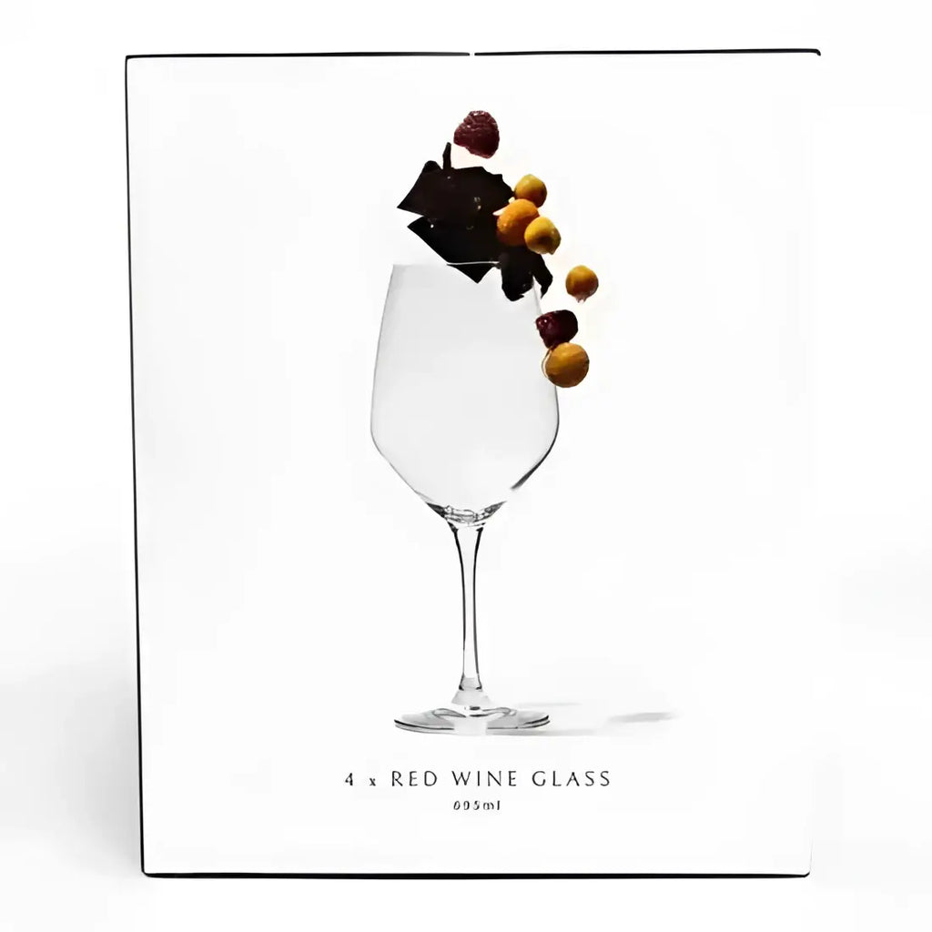 Red wine glass with berries on a white background