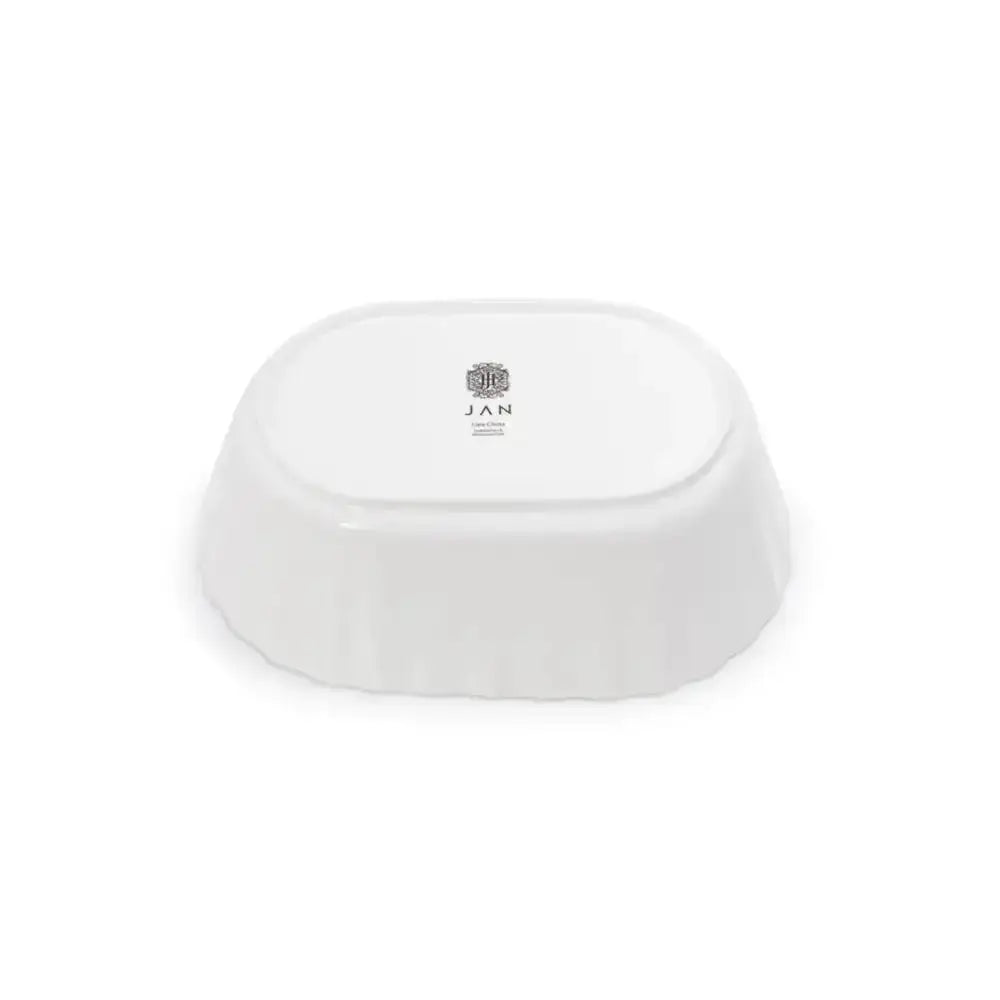 White ceramic bowl with 'JAN' branding on a white background