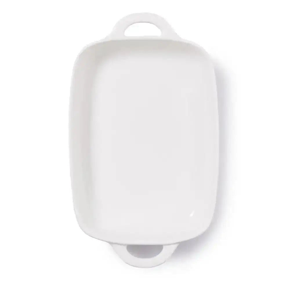 White ceramic dish with handles on a white background