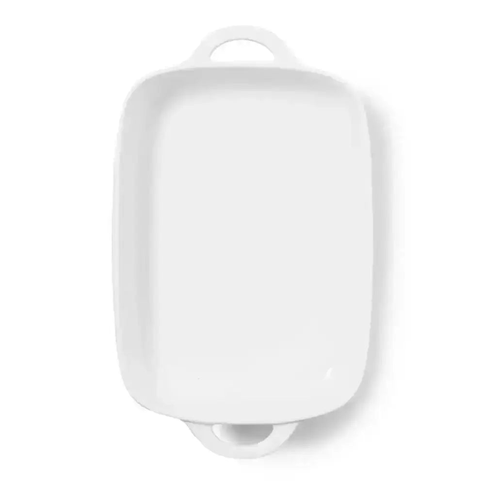 White ceramic rectangular dish with handles on a white background