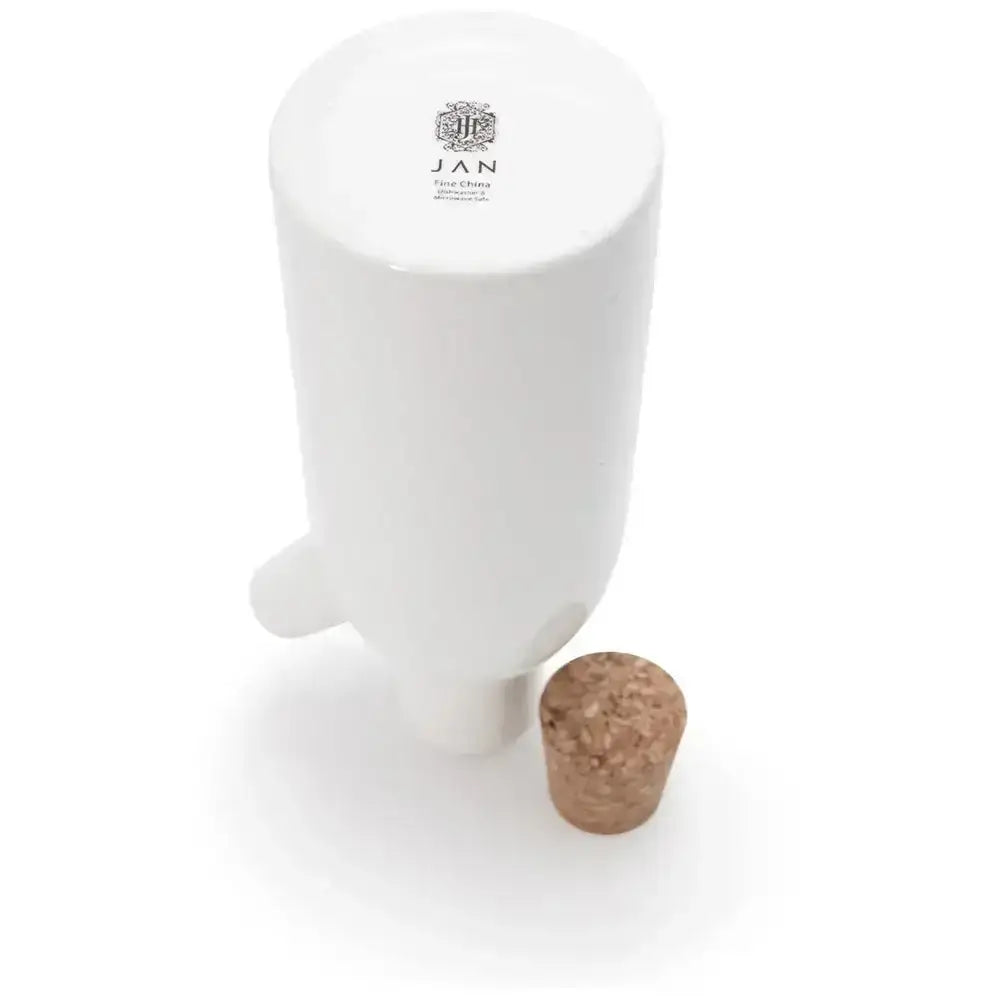 White ceramic container with a cork on a white background
