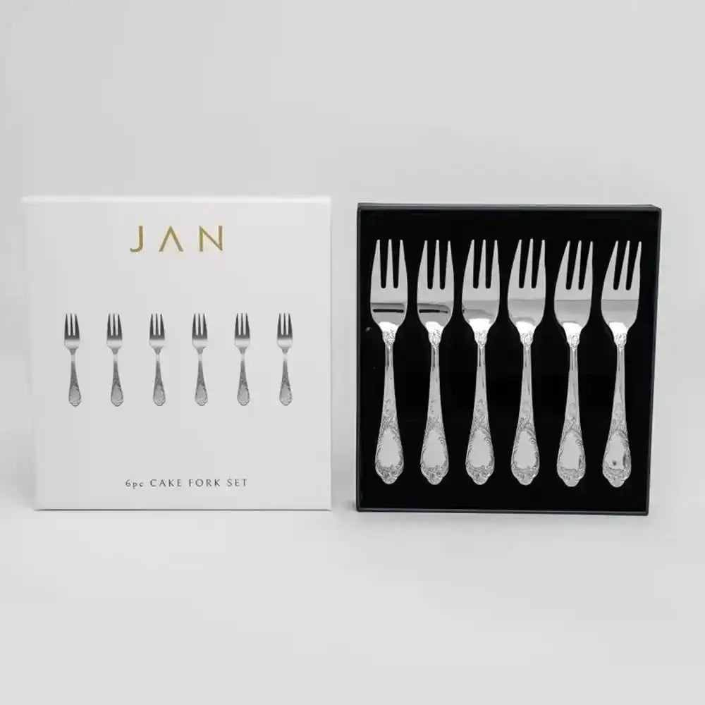Set of cake forks in a black box with 'JAN' branding on a white background