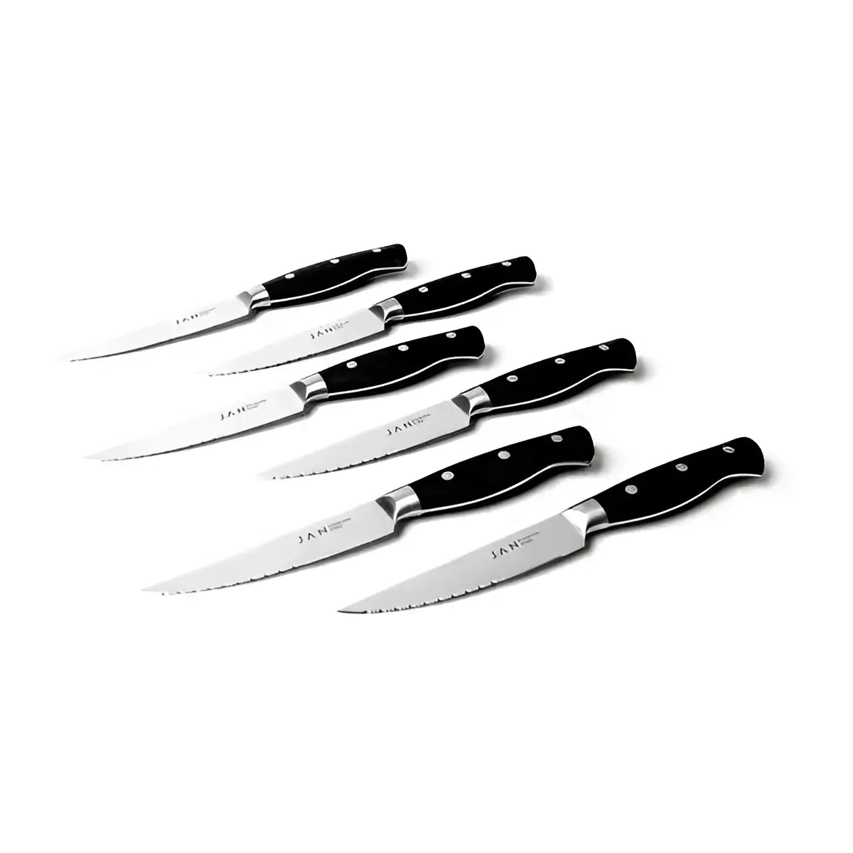 Set of five JAN steak knives on a white background