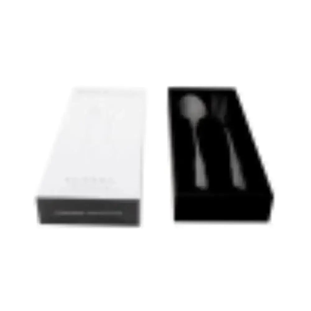 Gift boxed cutlery set with spoon and fork displayed in black and white packaging
