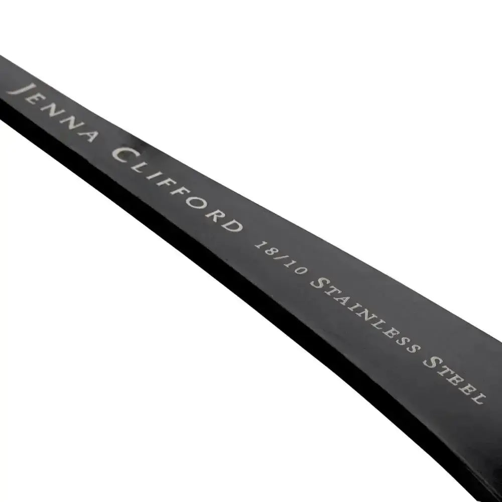 Close-up of black 18/10 stainless steel flatware handle with engraved text