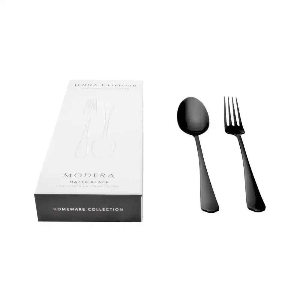 Matte black fork and spoon set beside white homeware collection box