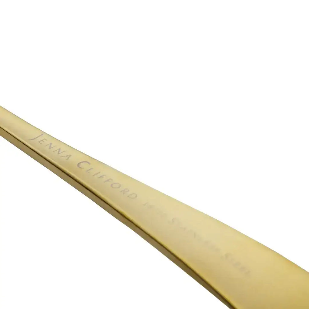Gold-toned metal spoon engraved with jenna clifford on handle from jenna clifford modera satin gold salad server set