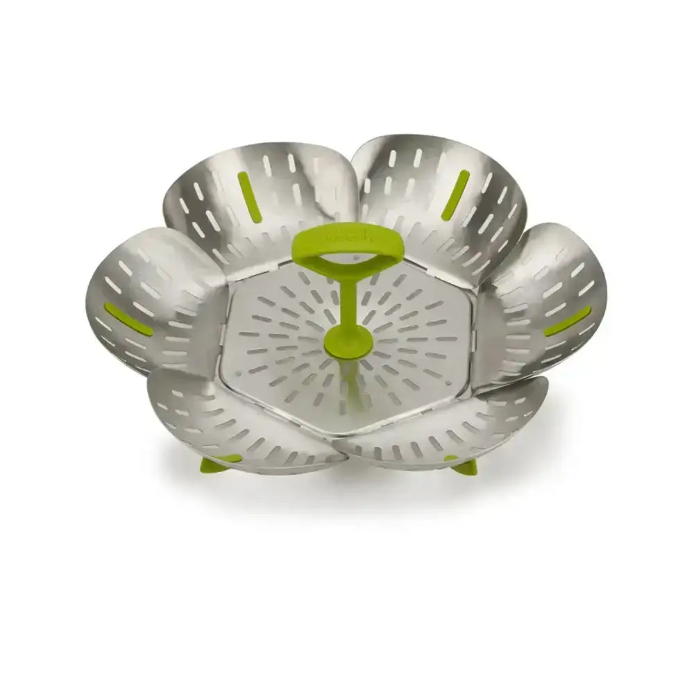 Metal steamer basket with green accents on a white background