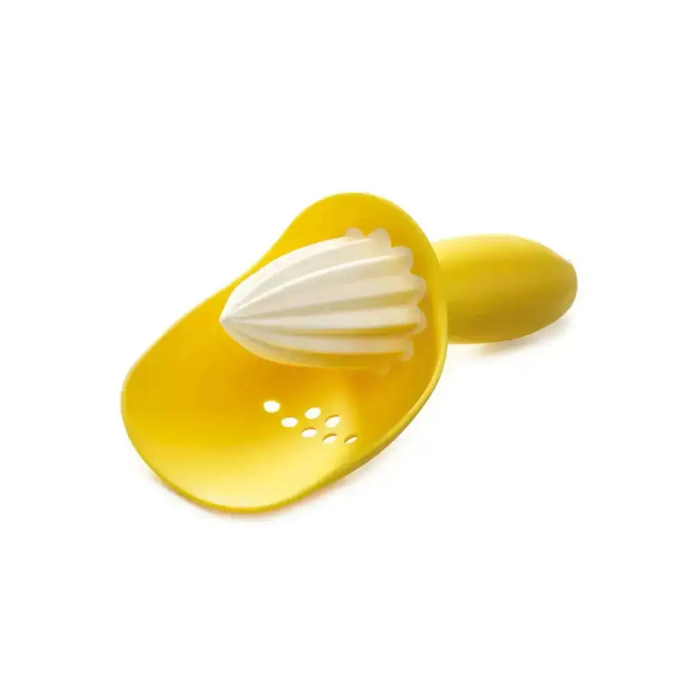 Yellow citrus juicer with white central part on a white background