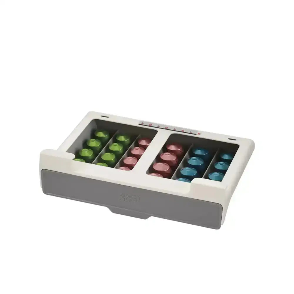 Rectangular container with colorful cylindrical objects on a white background