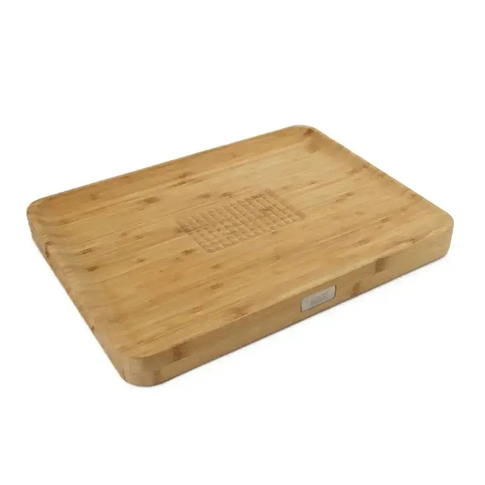 Bamboo cutting board with a engraved pattern on a white background