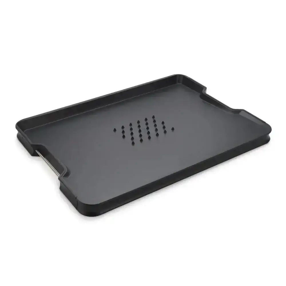 Black cutting board on a white background