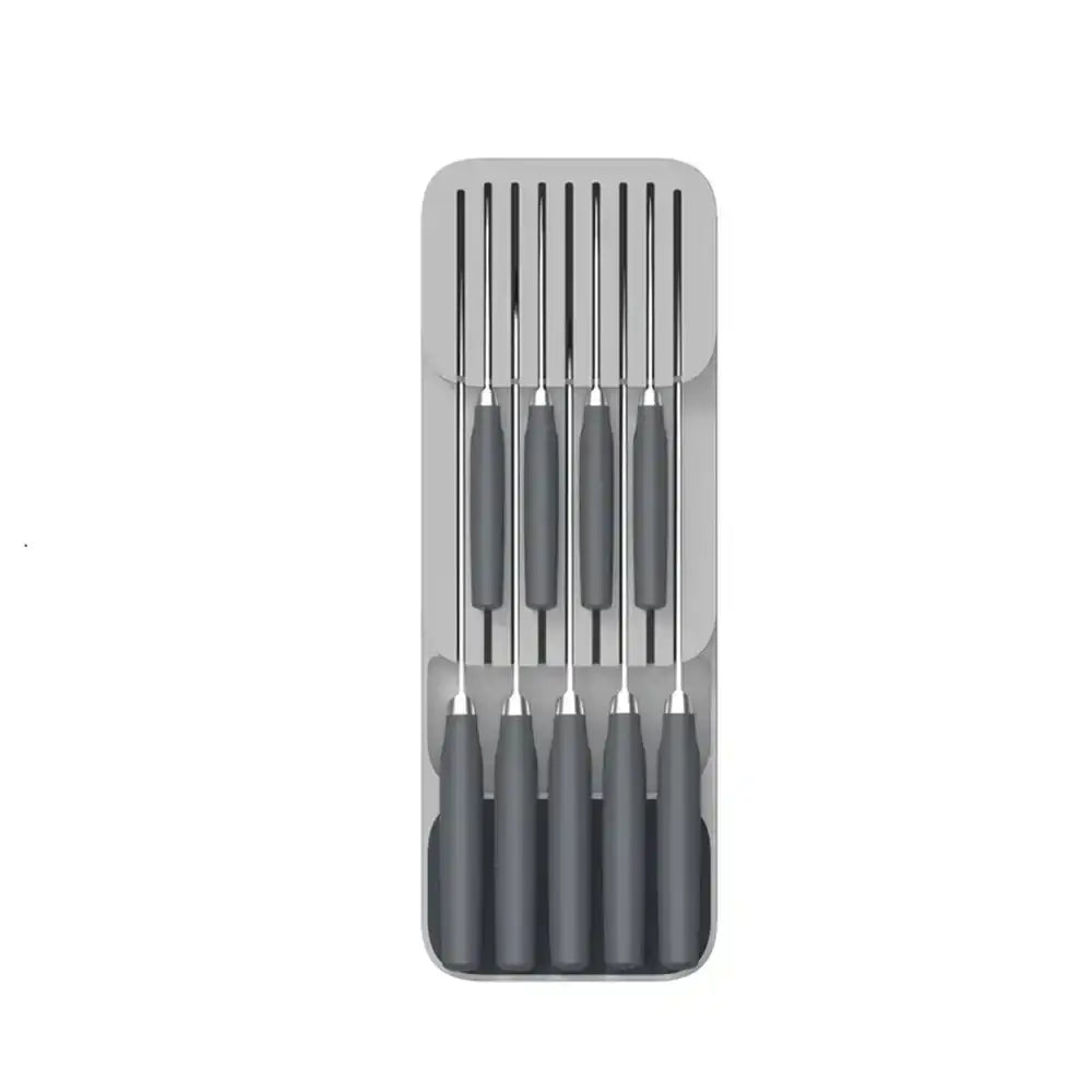 Set of six black knives with gray handles in a plastic case on a white background