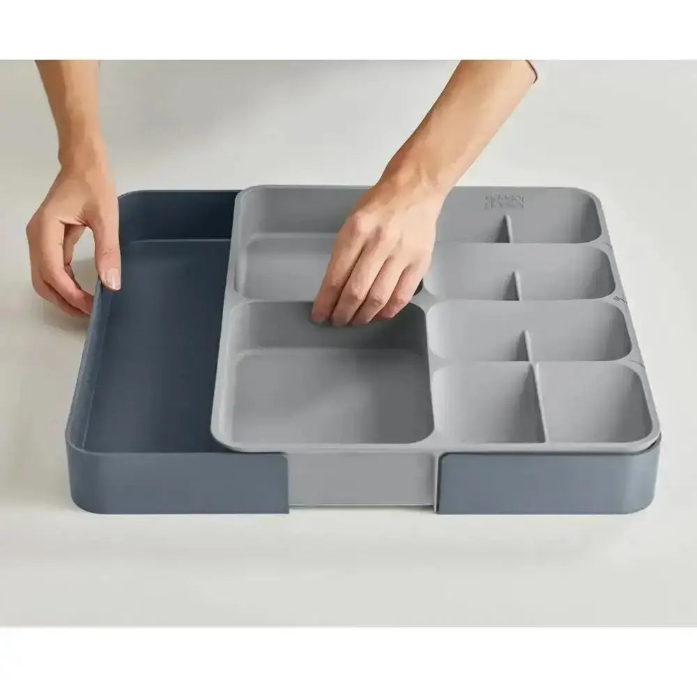 Gray tray with compartments on a white background