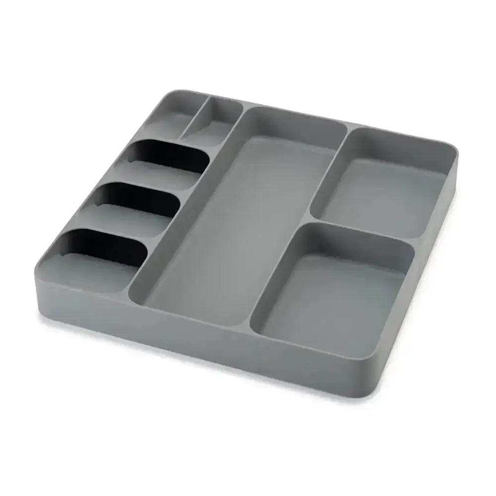 Gray plastic organizer tray with multiple compartments on a white background