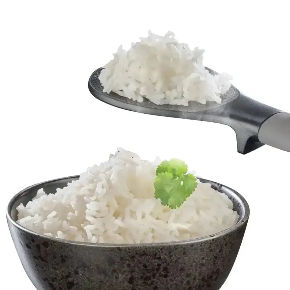 Bowl of white rice with a serving spoon on a white background