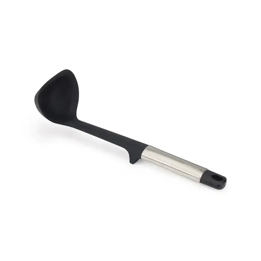 Black ladle with a metallic handle on a white background