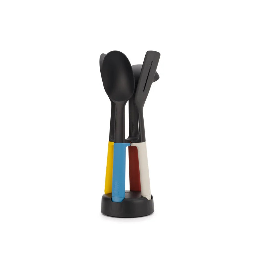 Colorful kitchen utensil holder with a spoon on a white background