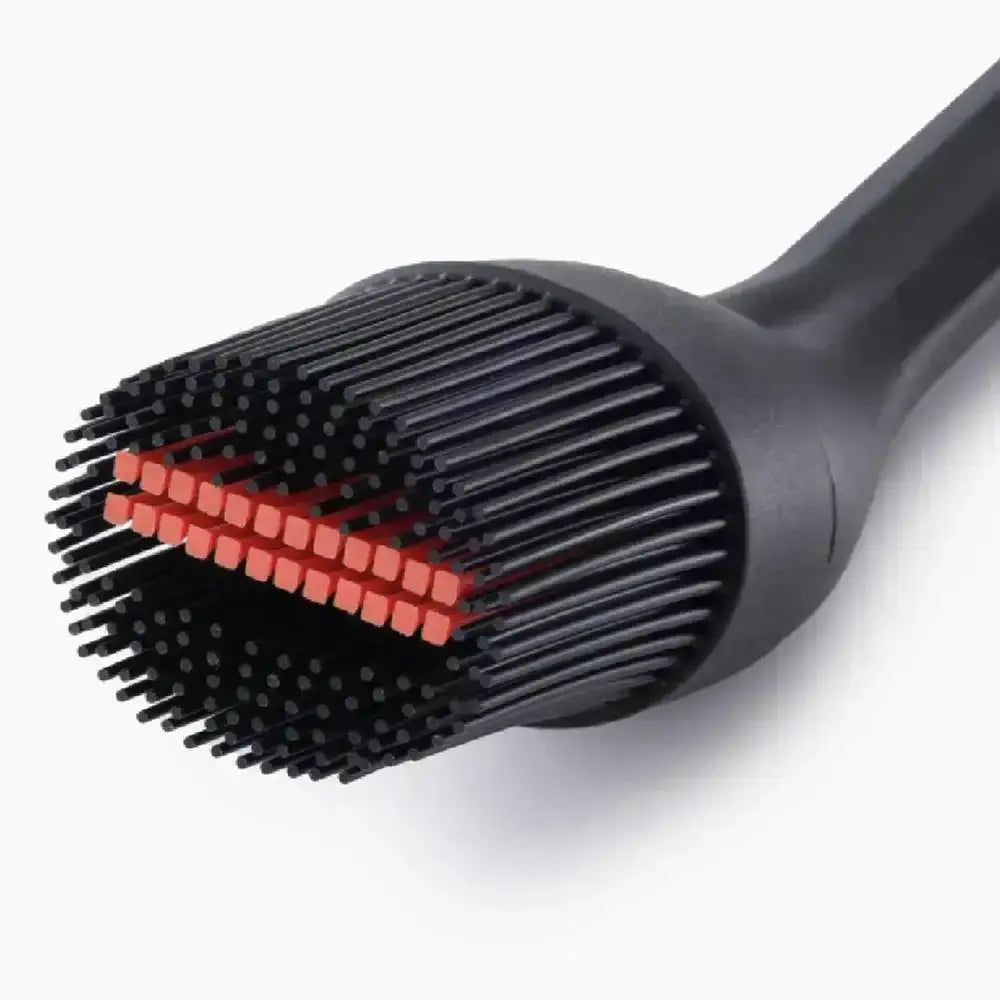 Black and red brush head on a white background