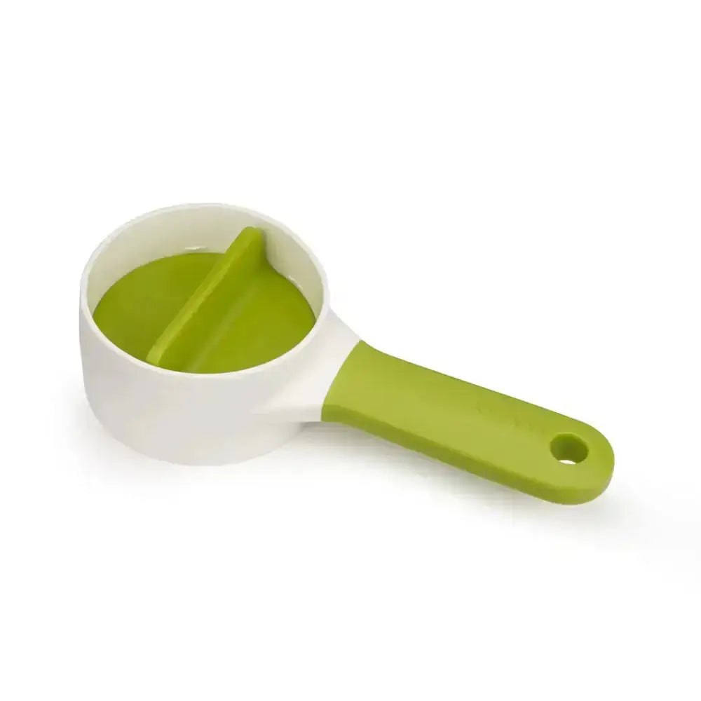 Green and white kitchen tool on a white background