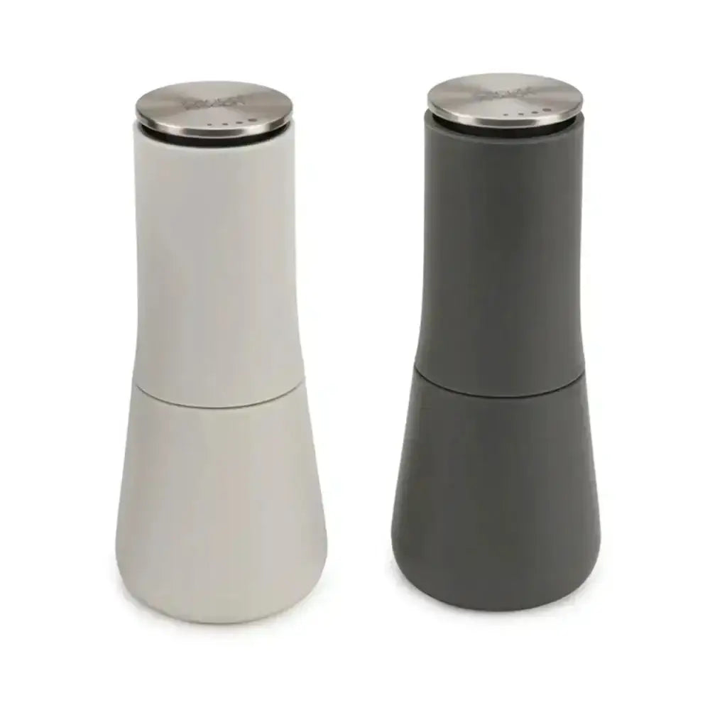 Two salt and pepper shakers, one white and one gray, on a white background.
