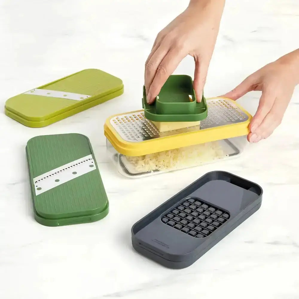 Multifunctional kitchen tool with green, yellow, and gray components on a white background