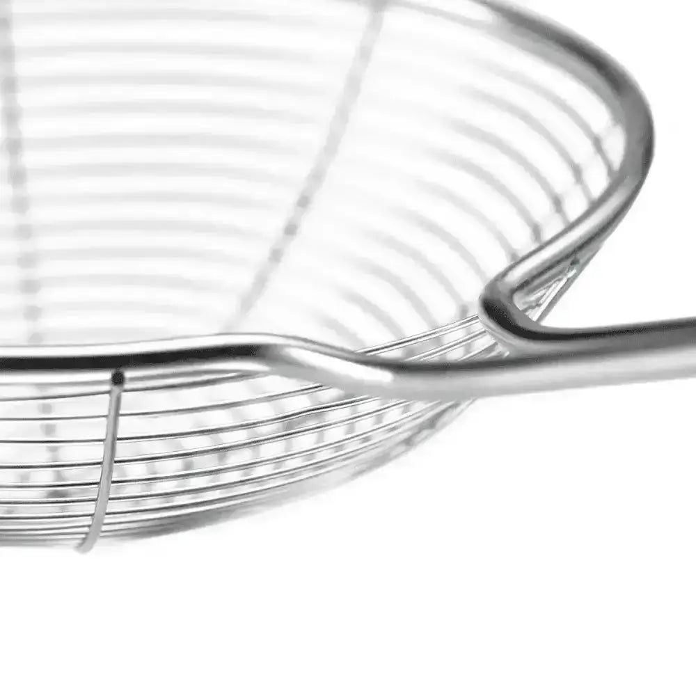Close-up of a metal wire basket on a white background