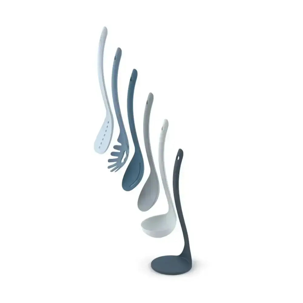Set of ladles in various shapes and sizes on a white background