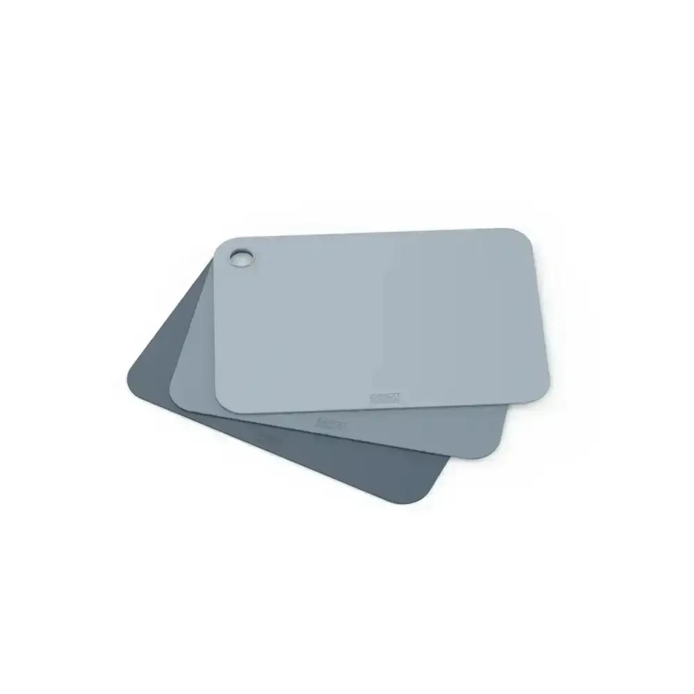 Set of three gray cutting boards on a white background