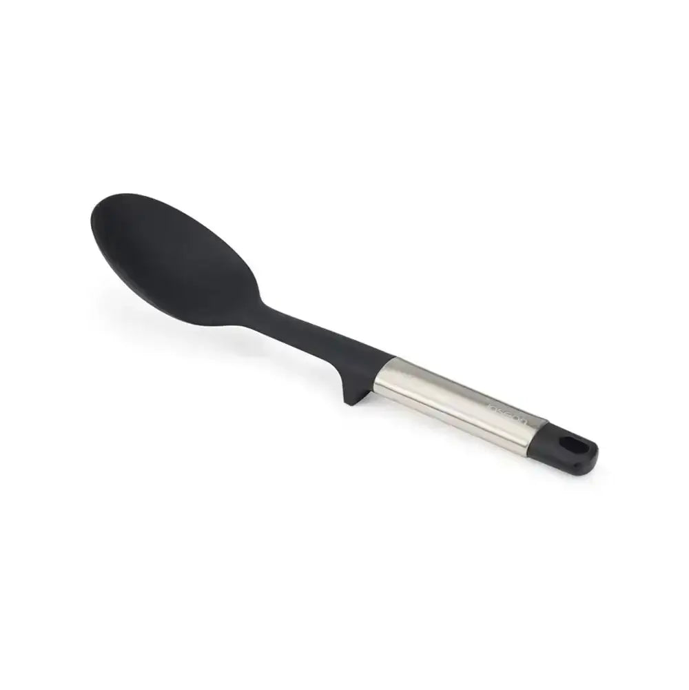 Black spoon with a metallic handle on a white background