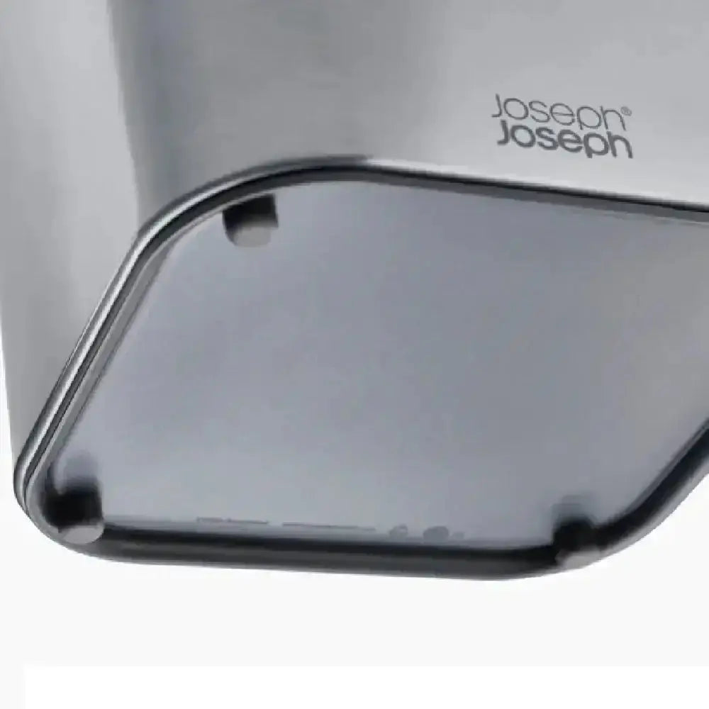 Close-up of a metallic kitchen tool with 'Joseph Joseph' branding on a white background