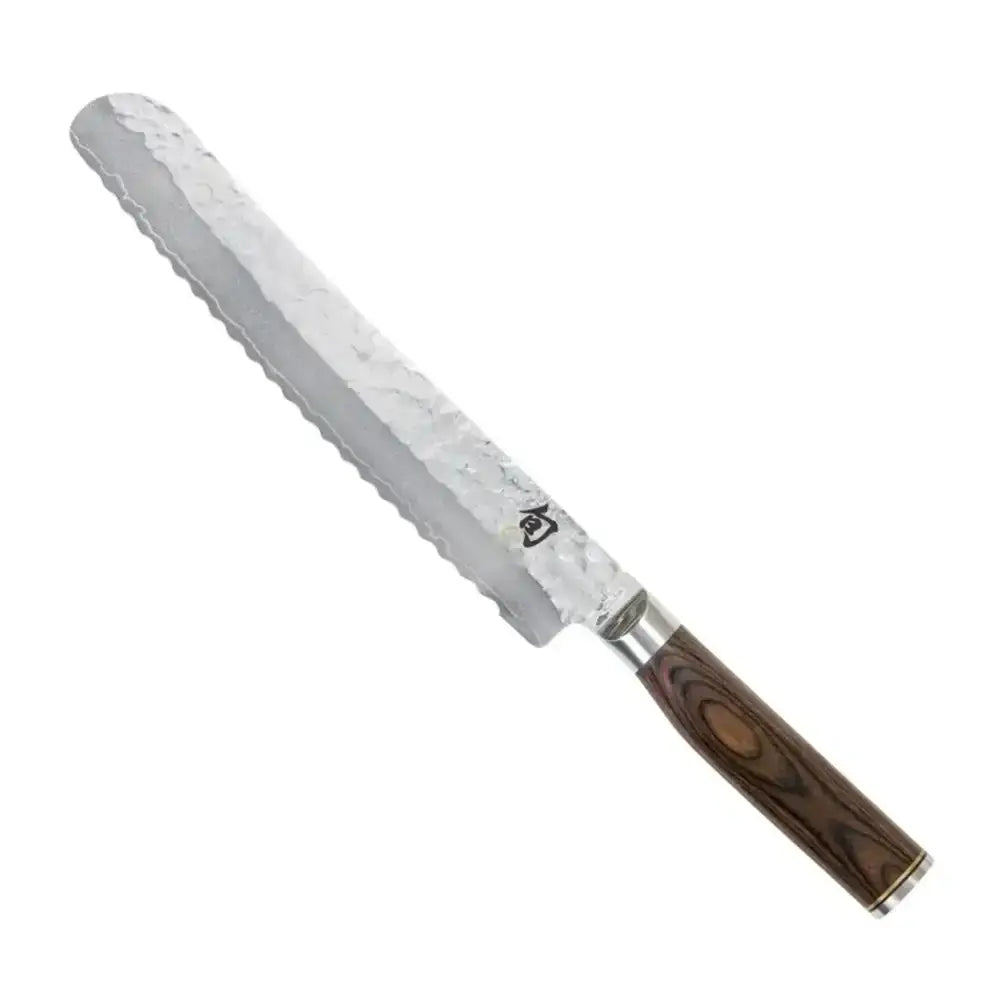 Bread knife with a wooden handle on a white background